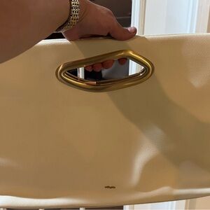 Cult Gaia Reza Cream Clutch with Gold Accent